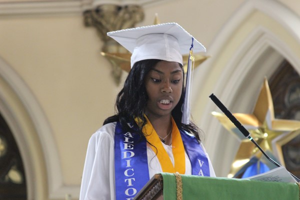 DLEACS Graduates recites poem